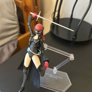 Black and Red Action Figure with Sword Anime Figurine